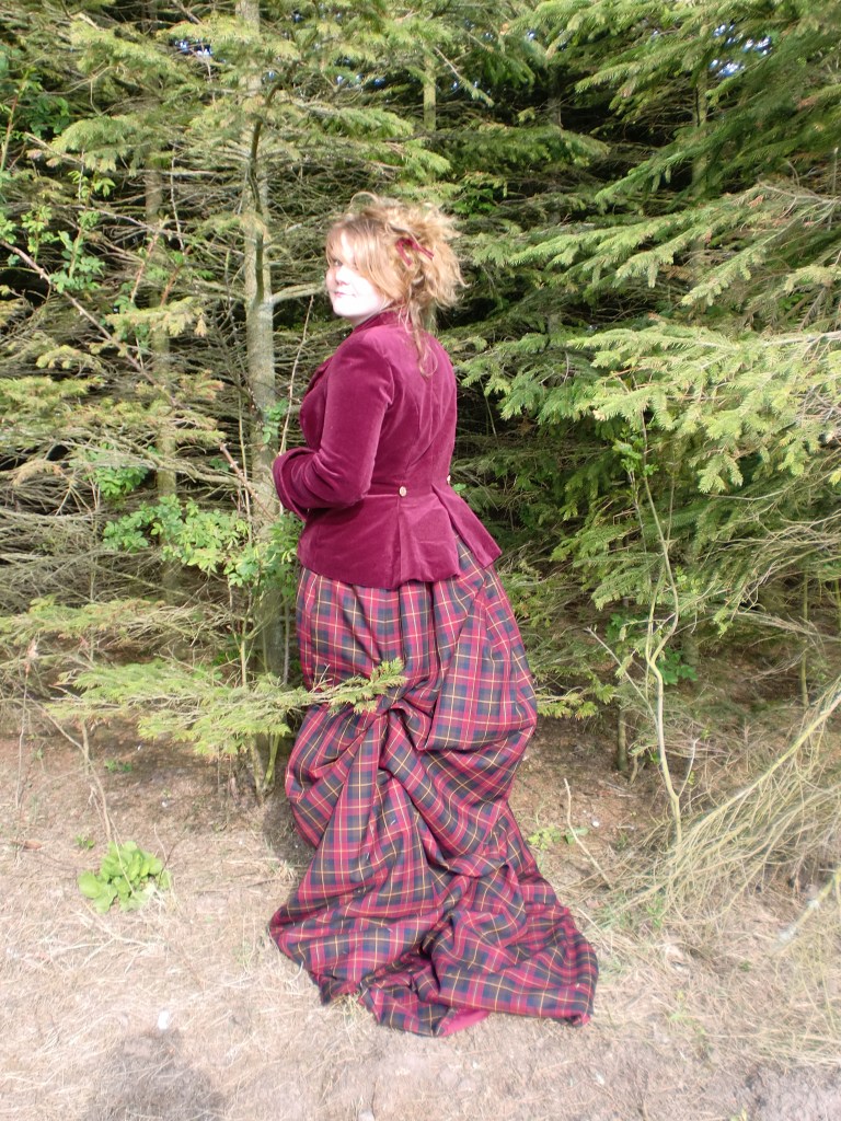 Photo of tailored jacket and bustle skirt