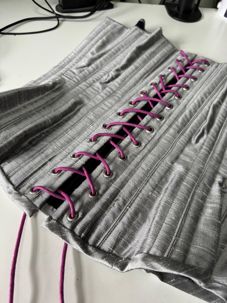 Silk corset with contrasting lacing